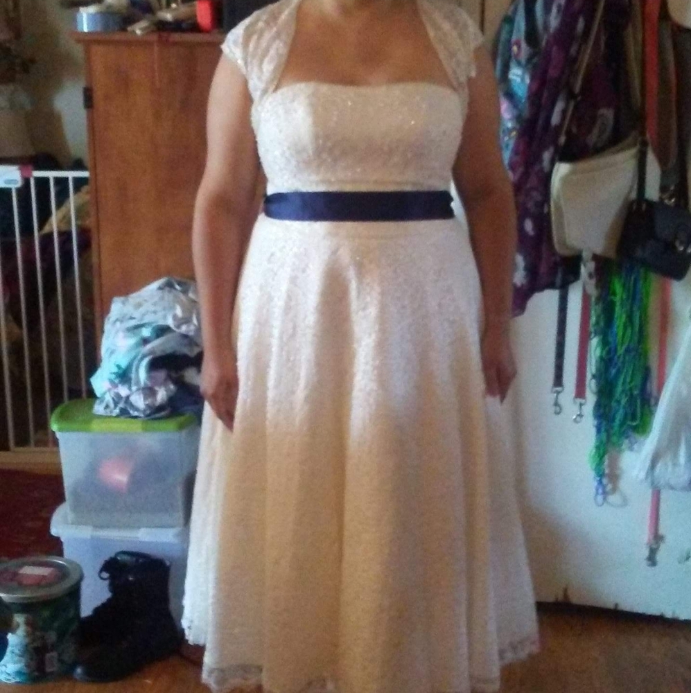 Ivory Lace Strapless Tea length wedding gown.
